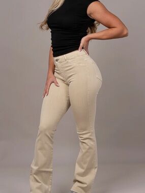 Pastel flared mid waisted fit jeans in Sand